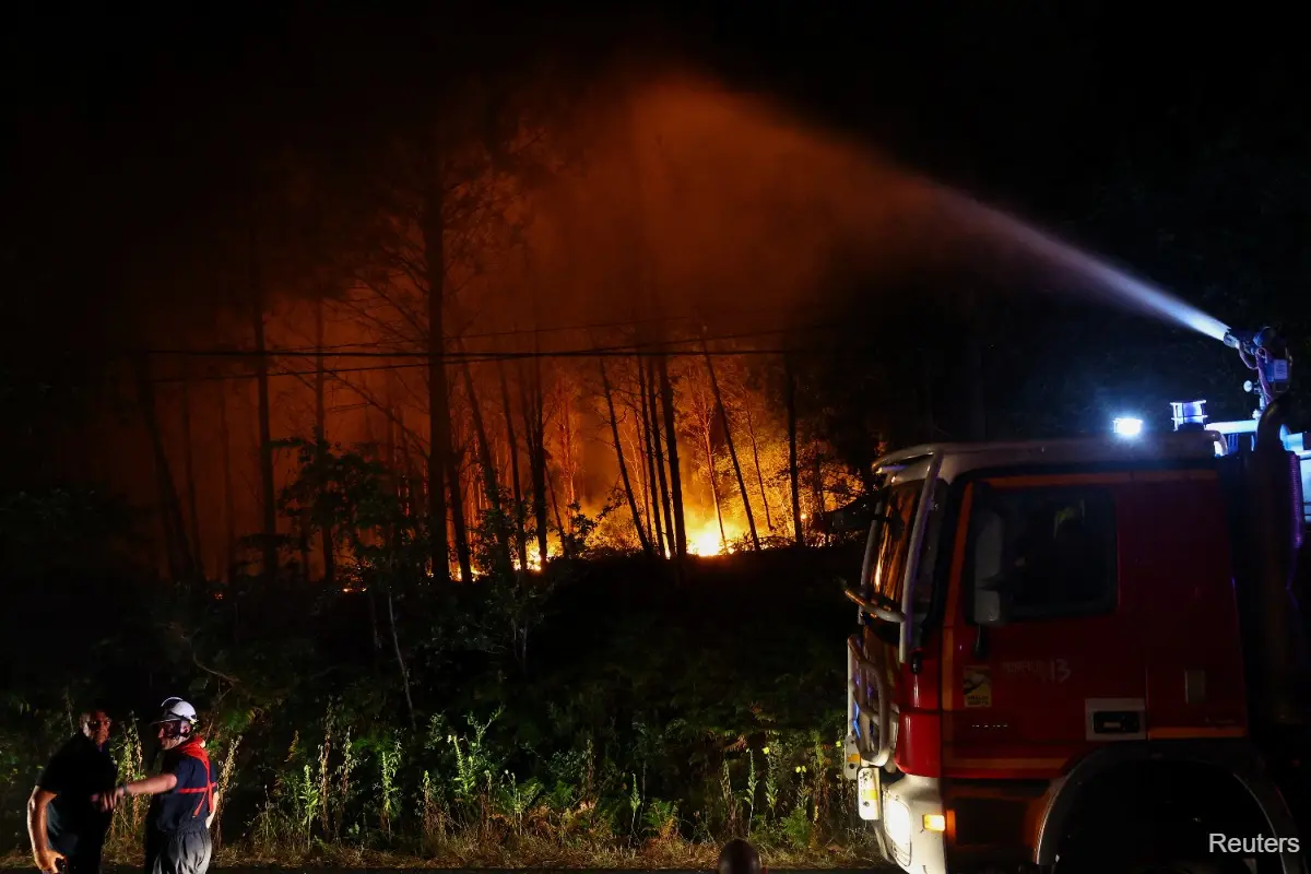 Wildfires burn across France and Spain amid heatwaves